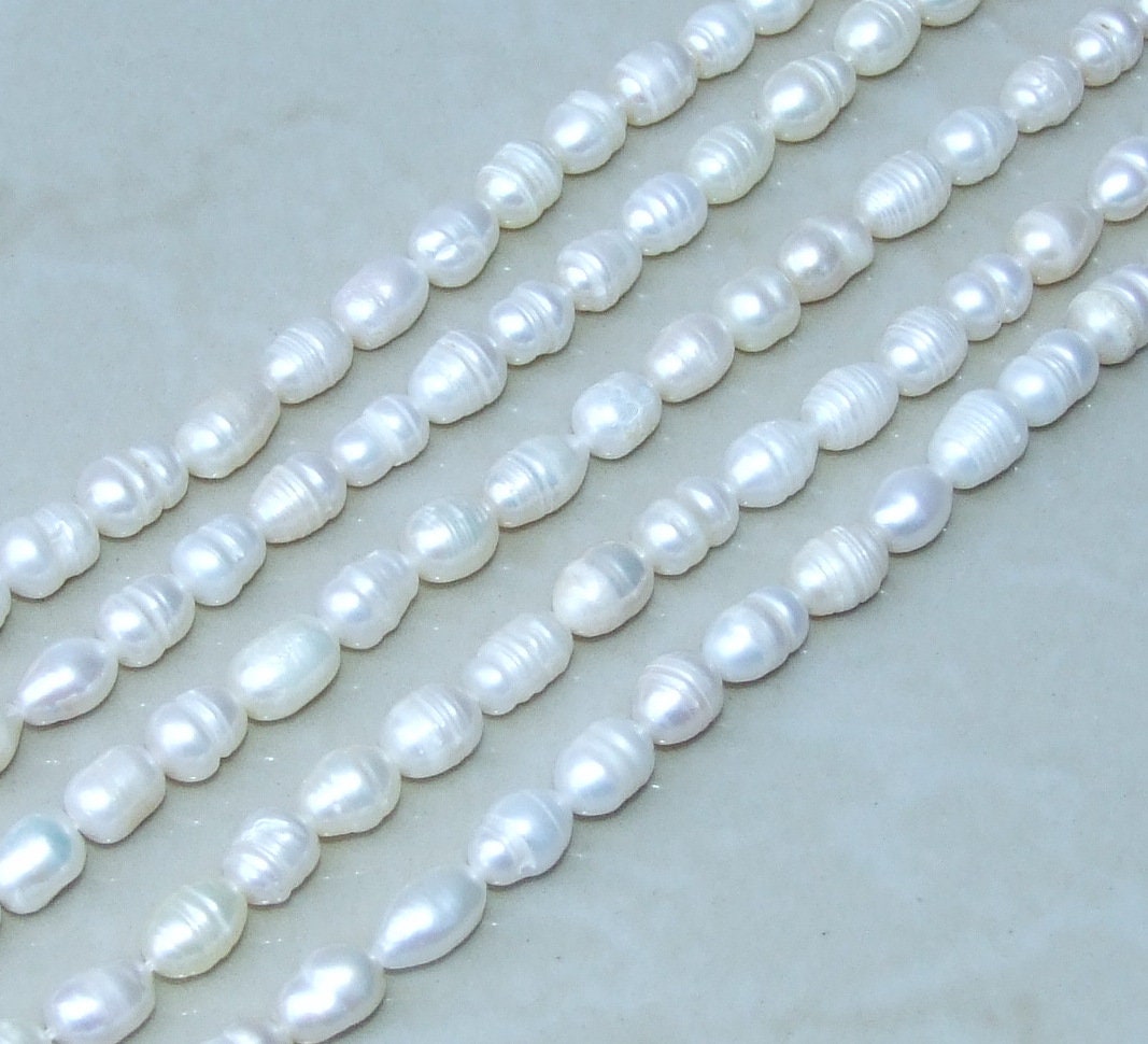 Natural Cultured Freshwater Pearl Beads, Rice Shape, 7mm x 10mm, Half Strand / Full Strand, 41E/A20 - EDGBeadsandGems