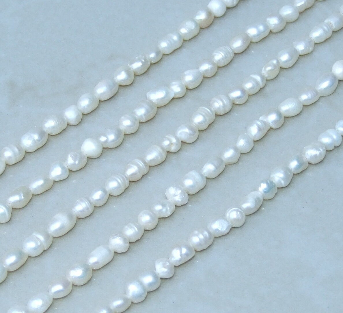 Natural Cultured Freshwater Pearl Beads, Rice Shape, 5mm x 7mm, Half Strand / Full Strand, 13A - EDGBeadsandGems