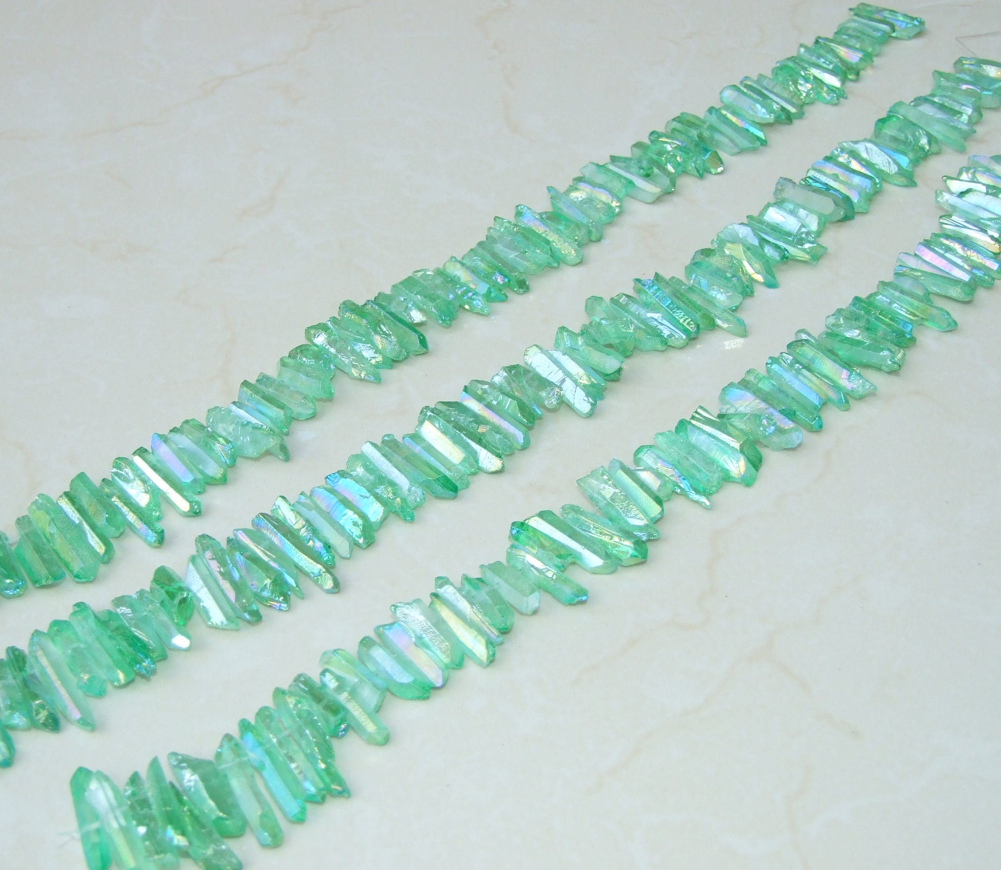 Green AB Titanium Quartz Crystal Points Strand, 15-30mm - EDGBeadsandGems