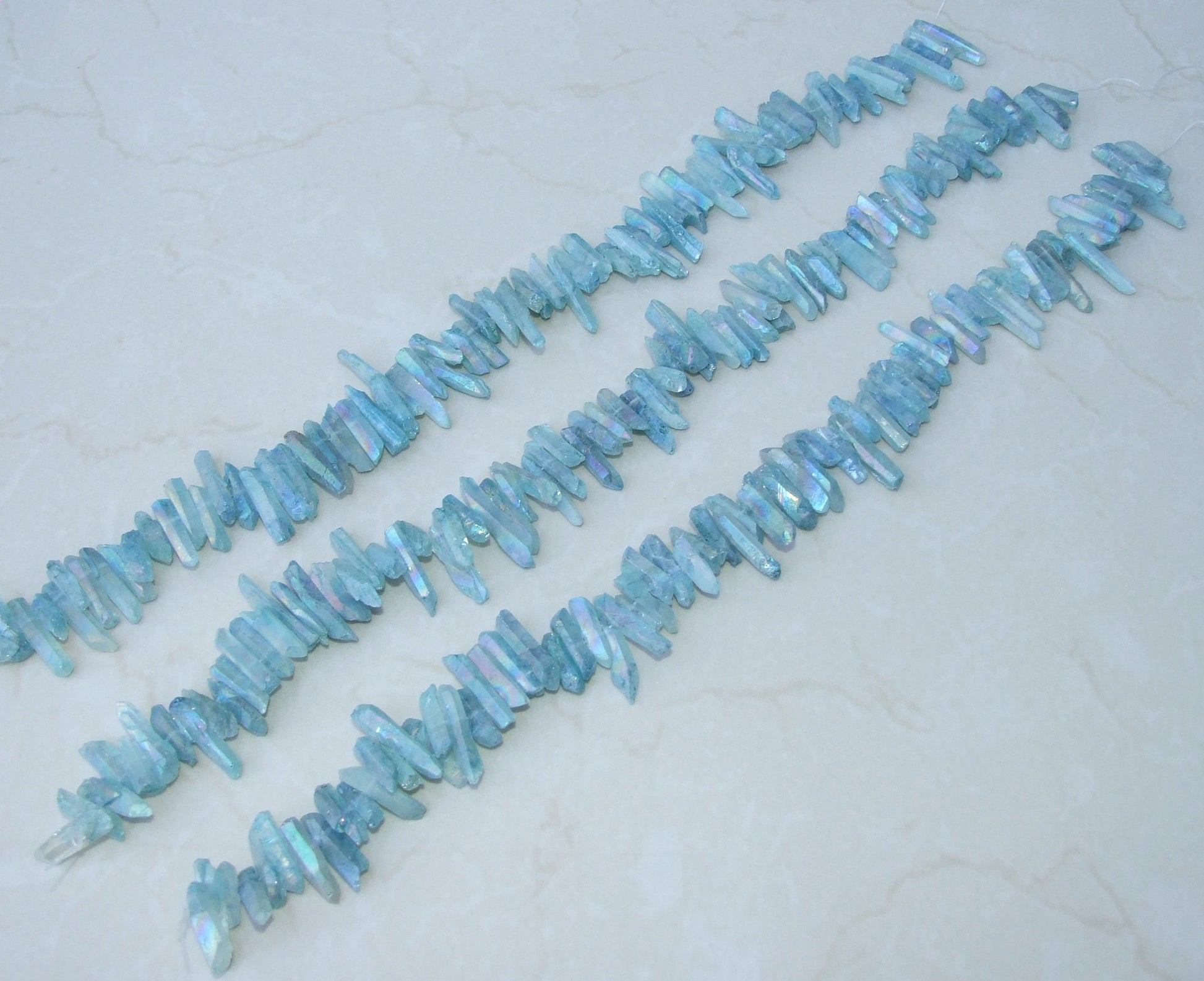 Light Aqua Blue Angel Aura Titanium Quartz Point, Quartz Points Strand, Raw Quartz Points, Quartz Crystals Points Strand of Beads, 20-30mm - EDGBeadsandGems