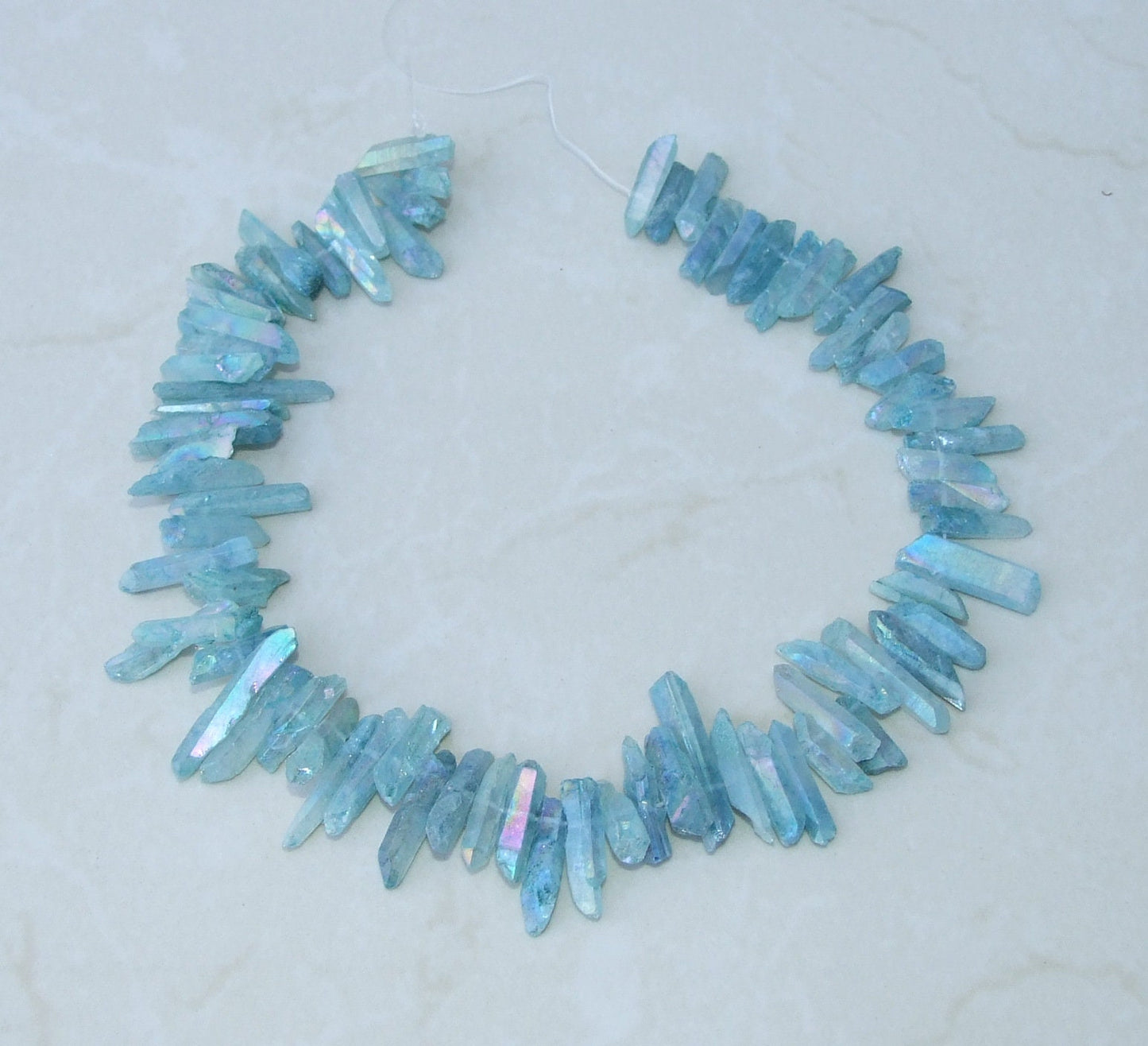 Light Aqua Blue Angel Aura Titanium Quartz Point, Quartz Points Strand, Raw Quartz Points, Quartz Crystals Points Strand of Beads, 20-30mm - EDGBeadsandGems