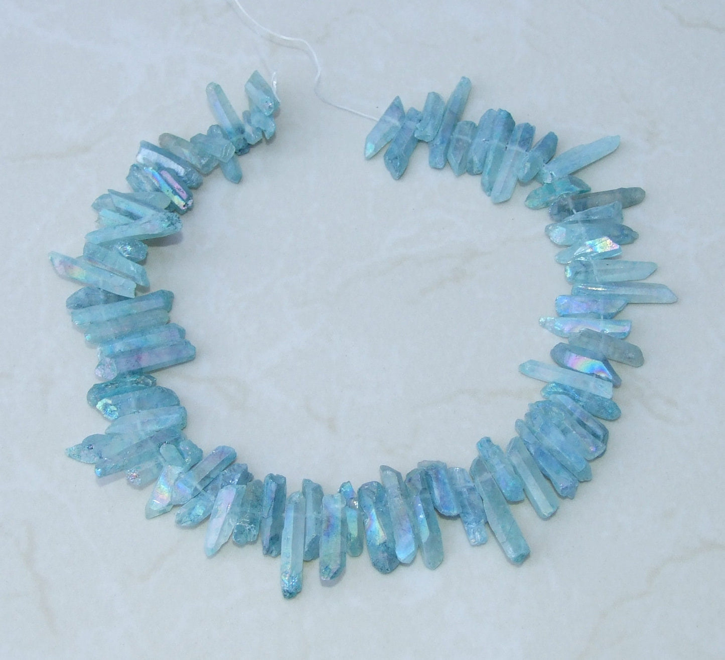 Light Aqua Blue Angel Aura Titanium Quartz Point, Quartz Points Strand, Raw Quartz Points, Quartz Crystals Points Strand of Beads, 20-30mm - EDGBeadsandGems