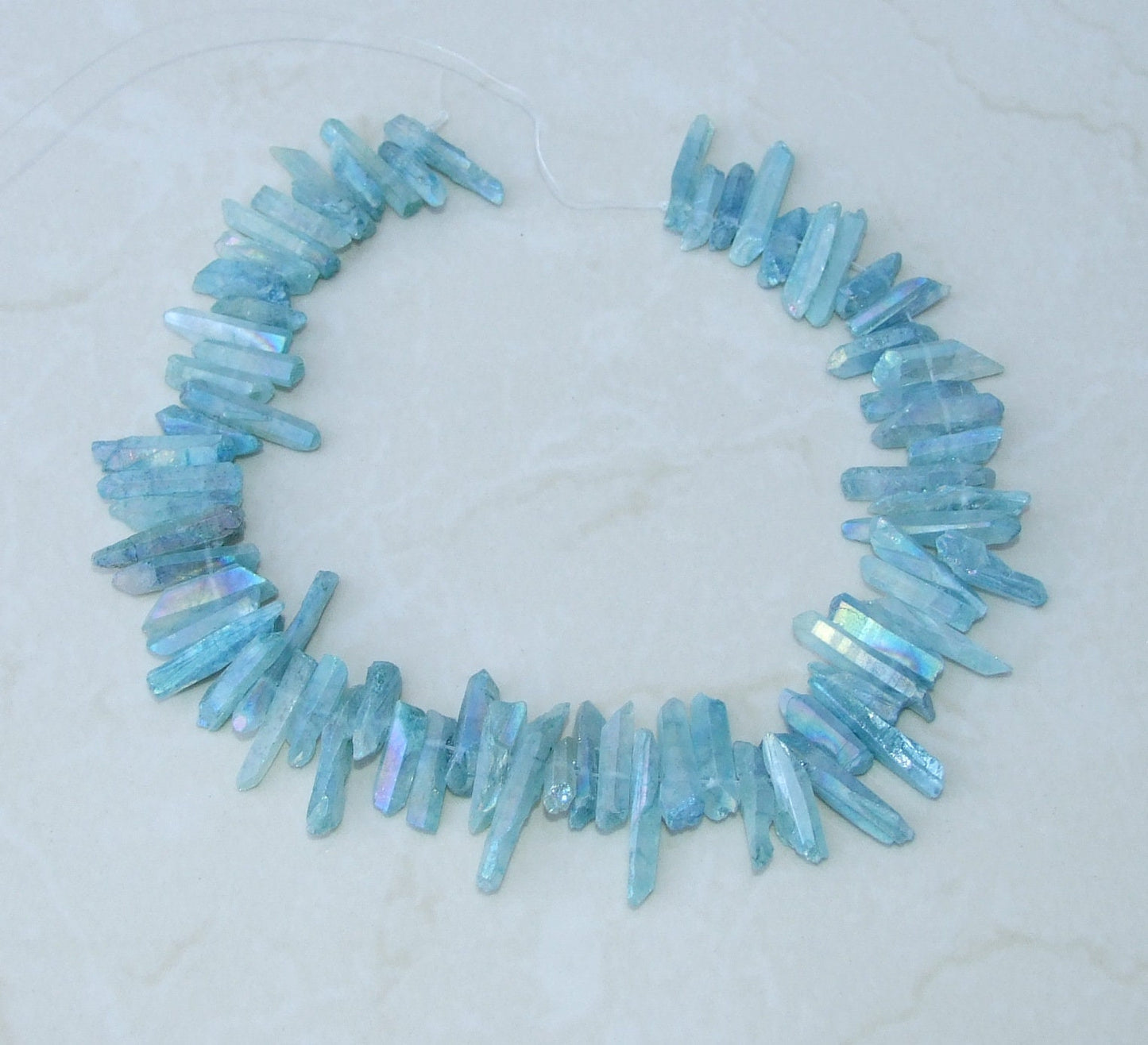 Light Aqua Blue Angel Aura Titanium Quartz Point, Quartz Points Strand, Raw Quartz Points, Quartz Crystals Points Strand of Beads, 20-30mm - EDGBeadsandGems