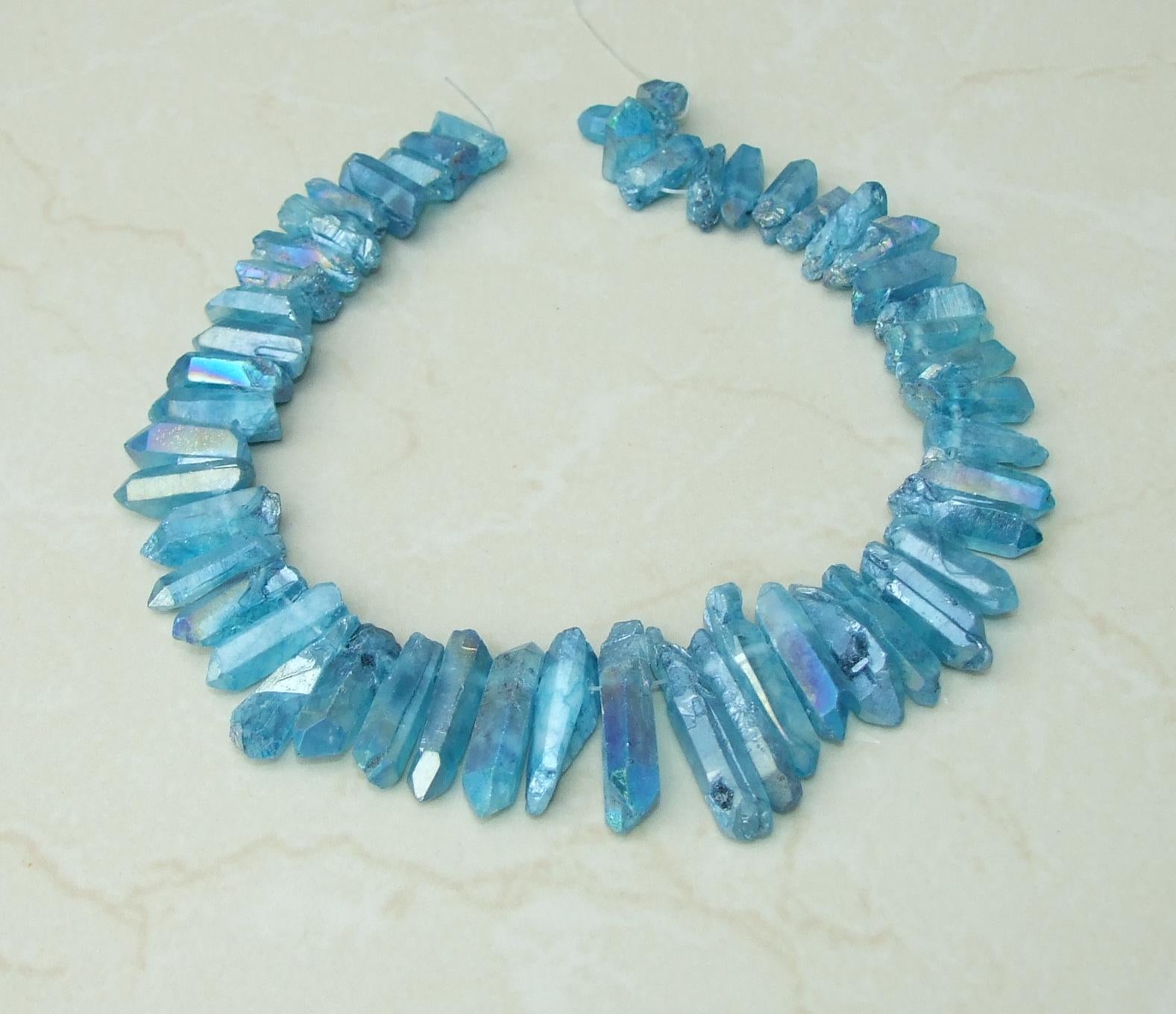 Electric Blue AB Titanium Quartz Crystal Points Strand, Top Drilled Beads (20-40mm) - EDGBeadsandGems