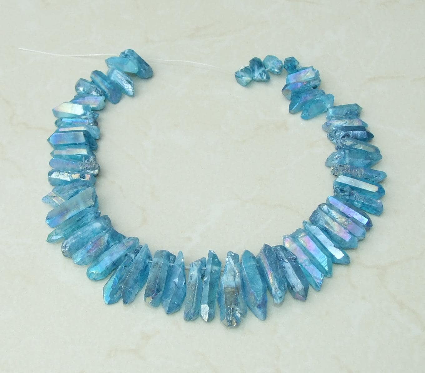 Electric Blue AB Titanium Quartz Crystal Points Strand, Top Drilled Beads (20-40mm) - EDGBeadsandGems